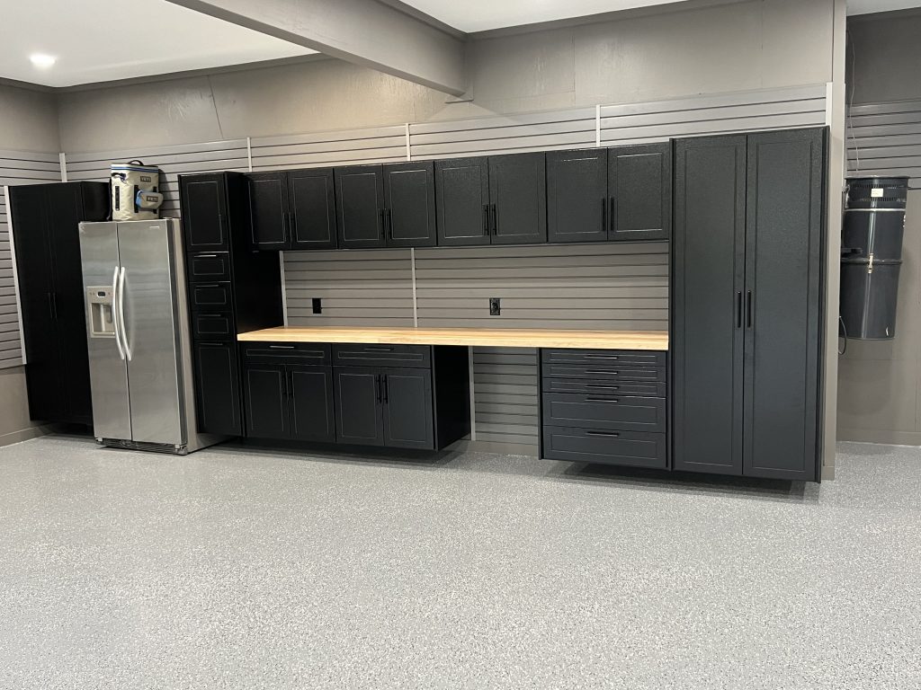 Custom Garage Cabinet, Garage Flooring, and Garage Slatwall Transformation in Denver